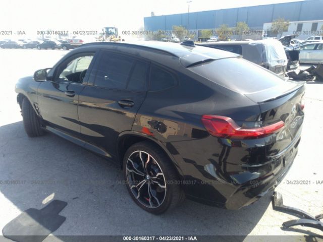 Photo 2 VIN: 5YMUJ0C05L9C17242 - BMW X4 M 