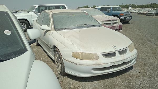 Photo 9 VIN: 6G1TL52J7YL527790 - CHEVROLET LUMINA 