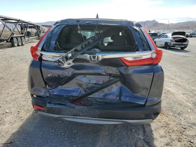 Photo 5 VIN: 7FARW5H34HE002692 - HONDA CR-V LX 