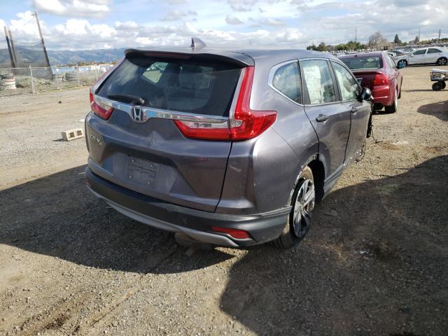 Photo 3 VIN: 7FARW5H38HE001139 - HONDA CR-V LX 