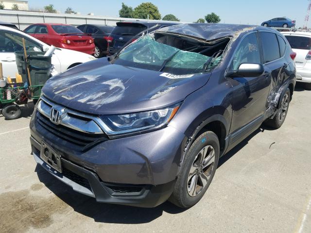 Photo 1 VIN: 7FARW5H3XHE003524 - HONDA CR-V LX 