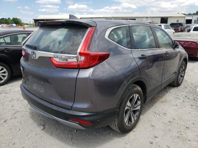 Photo 3 VIN: 7FARW5H3XHE013342 - HONDA CR-V LX 