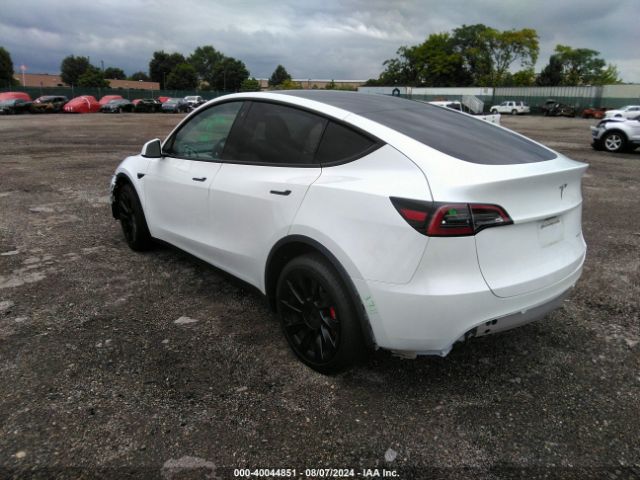 Photo 2 VIN: 7FAYGDEE1PA128964 - TESLA MODEL Y LONG RANGE AWD 