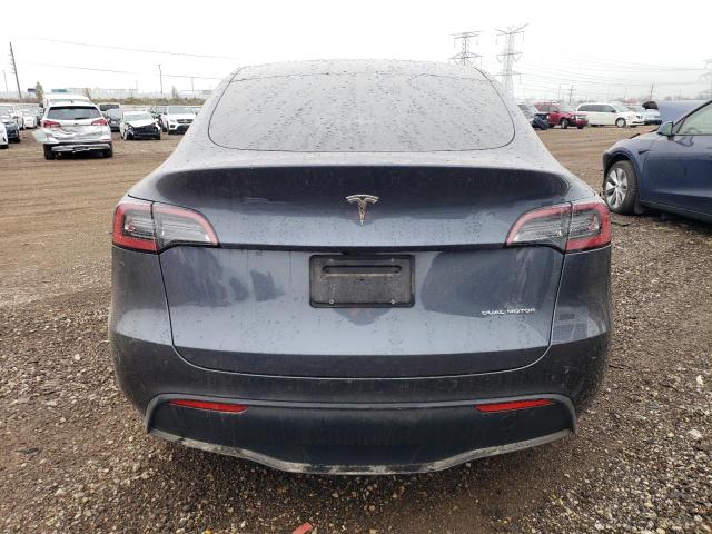 Photo 5 VIN: 7SAYGAEE1PF669093 - TESLA MODEL Y 