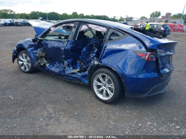 Photo 2 VIN: 7SAYGAEE1PF806470 - TESLA MODEL Y 