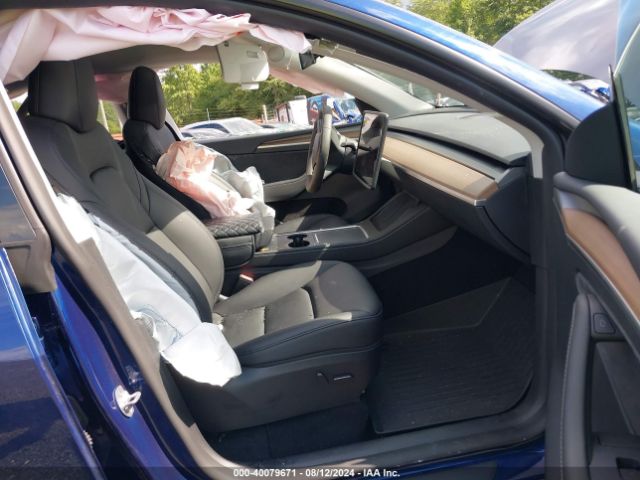 Photo 4 VIN: 7SAYGAEE1PF806470 - TESLA MODEL Y 