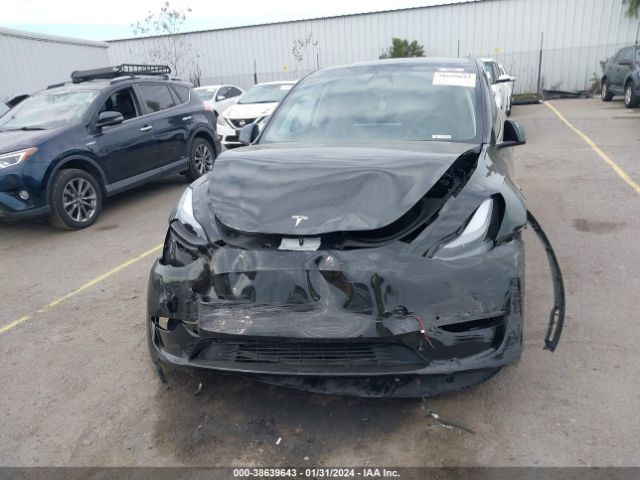 Photo 5 VIN: 7SAYGAEE2PF871702 - TESLA MODEL Y 