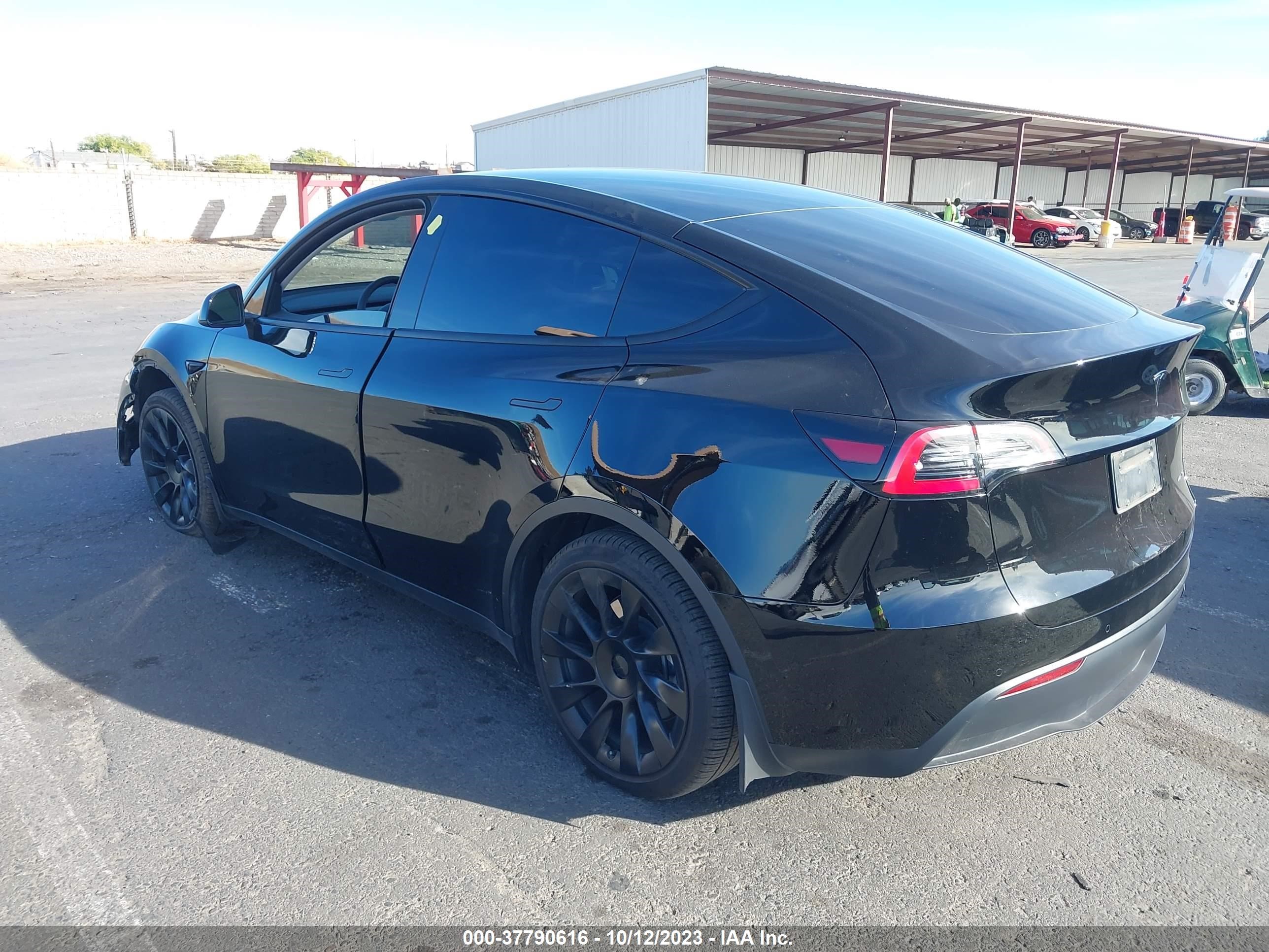 Photo 2 VIN: 7SAYGAEE5NF549696 - TESLA MODEL Y 