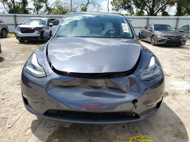 Photo 4 VIN: 7SAYGAEE6PF661104 - TESLA MODEL Y 