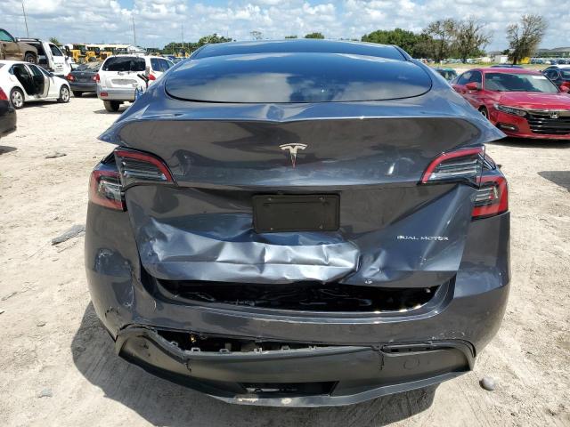 Photo 5 VIN: 7SAYGAEE6PF661104 - TESLA MODEL Y 