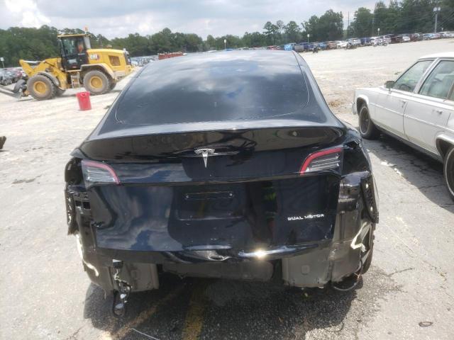 Photo 5 VIN: 7SAYGAEE6PF775247 - TESLA MODEL Y 