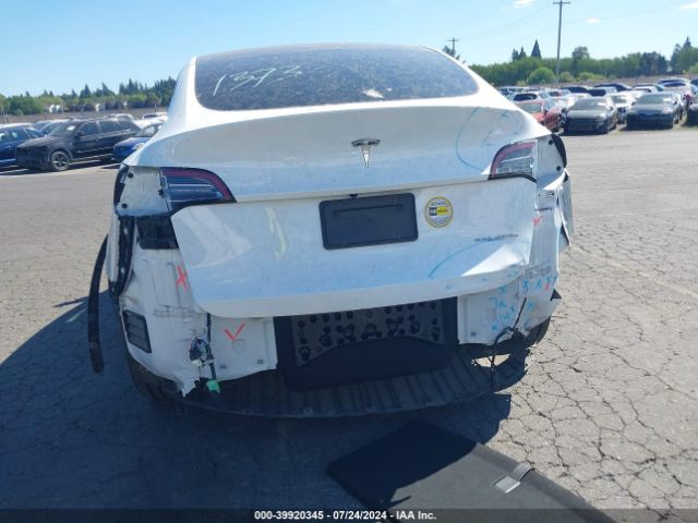 Photo 5 VIN: 7SAYGAEE7PF694886 - TESLA MODEL Y 