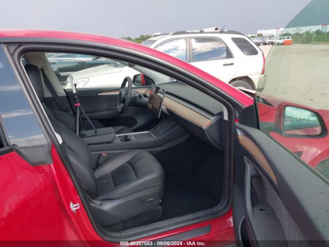 Photo 4 VIN: 7SAYGAEE7PF750146 - TESLA MODEL Y 