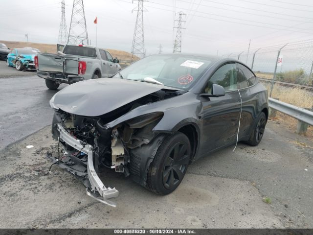 Photo 1 VIN: 7SAYGAEE7PF857018 - TESLA MODEL Y 