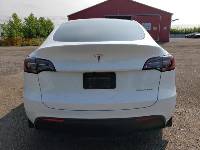 Photo 5 VIN: 7SAYGAEE8PF761897 - TESLA MODEL Y 