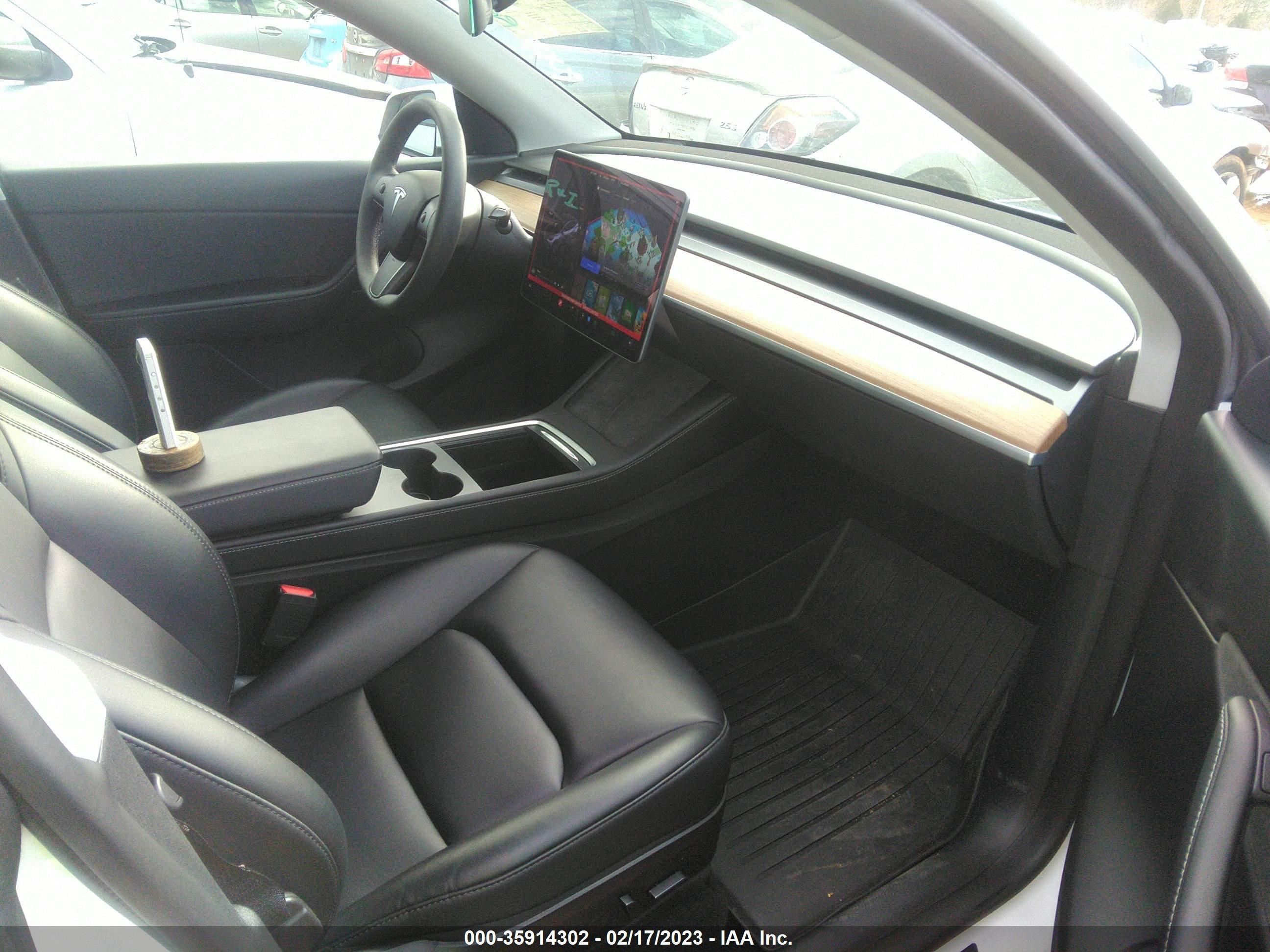 Photo 4 VIN: 7SAYGAEE9NF339750 - TESLA MODEL Y 