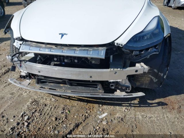 Photo 5 VIN: 7SAYGAEE9PF592327 - TESLA MODEL Y 