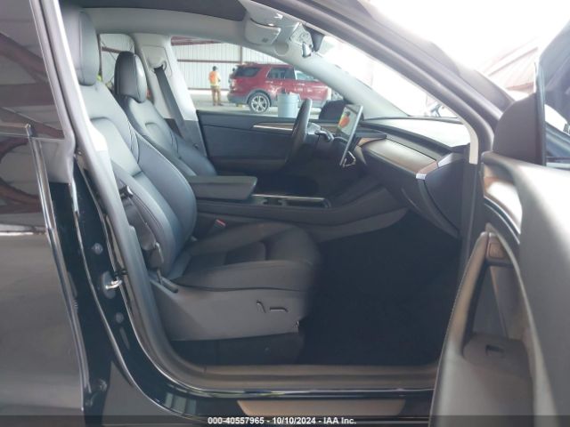 Photo 4 VIN: 7SAYGAEE9PF716337 - TESLA MODEL Y 