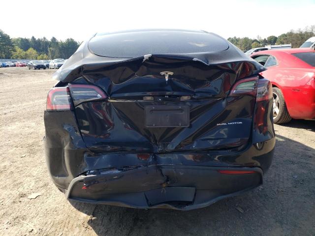 Photo 5 VIN: 7SAYGAEE9PF932592 - TESLA MODEL Y 