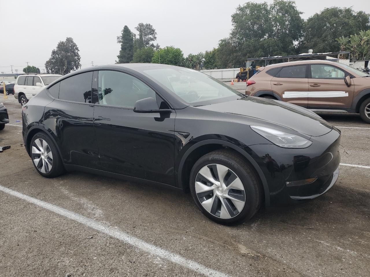 Photo 3 VIN: 7SAYGDED2PF971999 - TESLA MODEL Y 