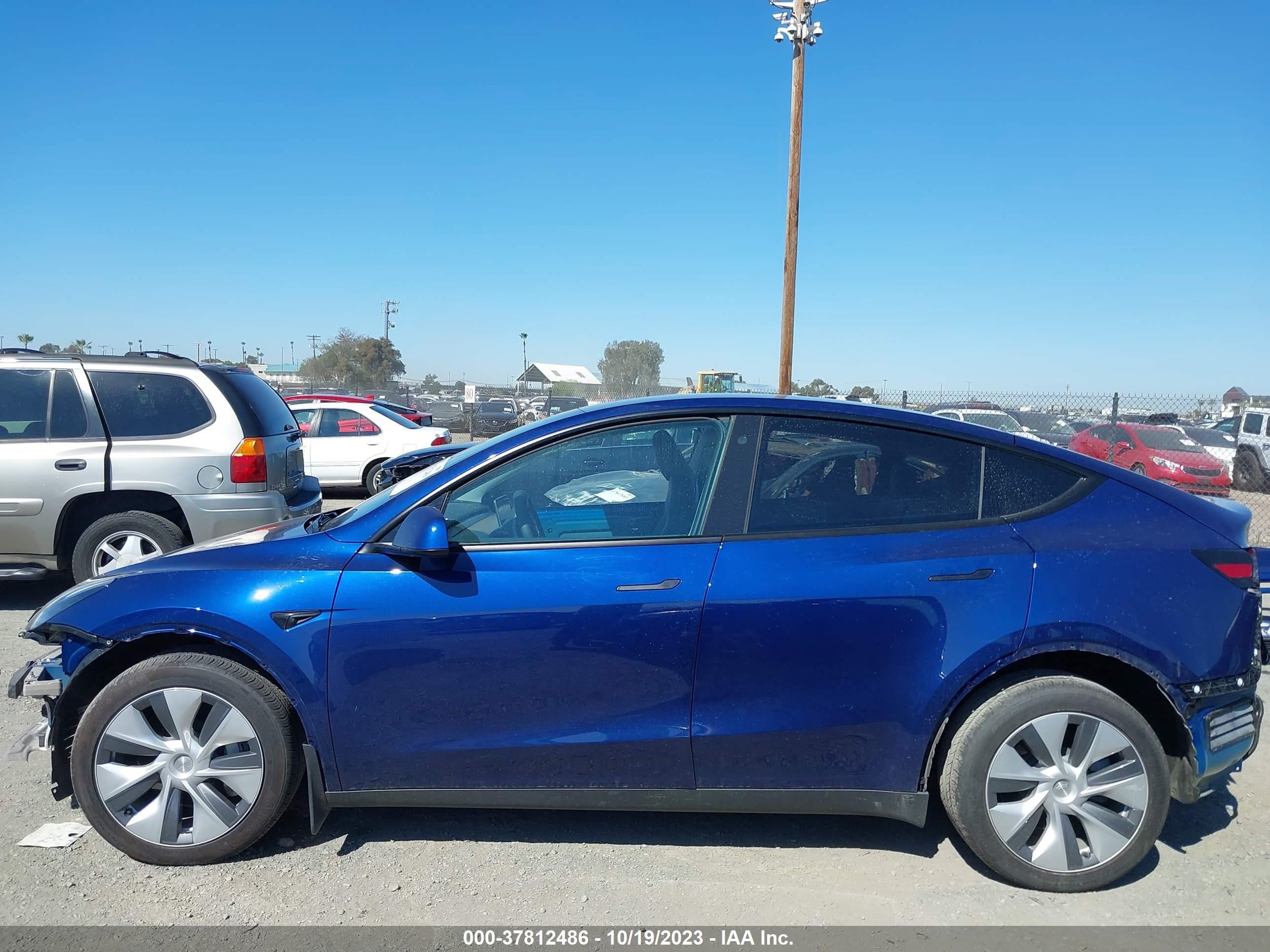 Photo 12 VIN: 7SAYGDEE2PA064644 - TESLA MODEL Y 