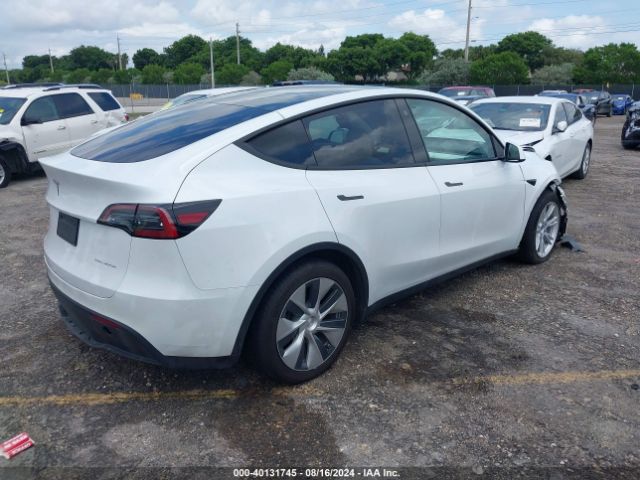 Photo 3 VIN: 7SAYGDEE4PF630063 - TESLA MODEL Y 