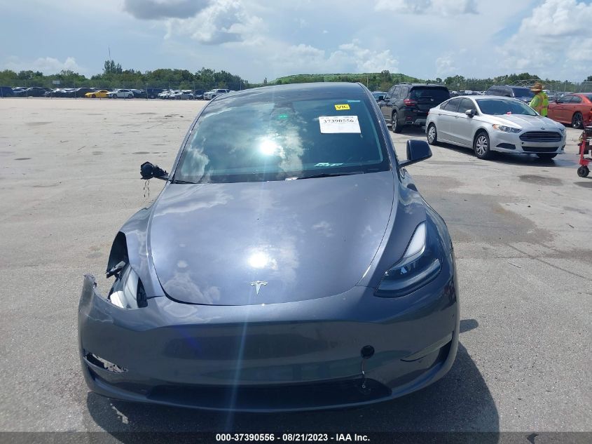 Photo 11 VIN: 7SAYGDEE4PF707336 - TESLA MODEL Y 