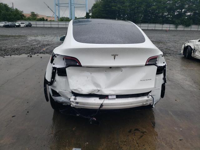 Photo 5 VIN: 7SAYGDEE4PF765351 - TESLA MODEL Y 