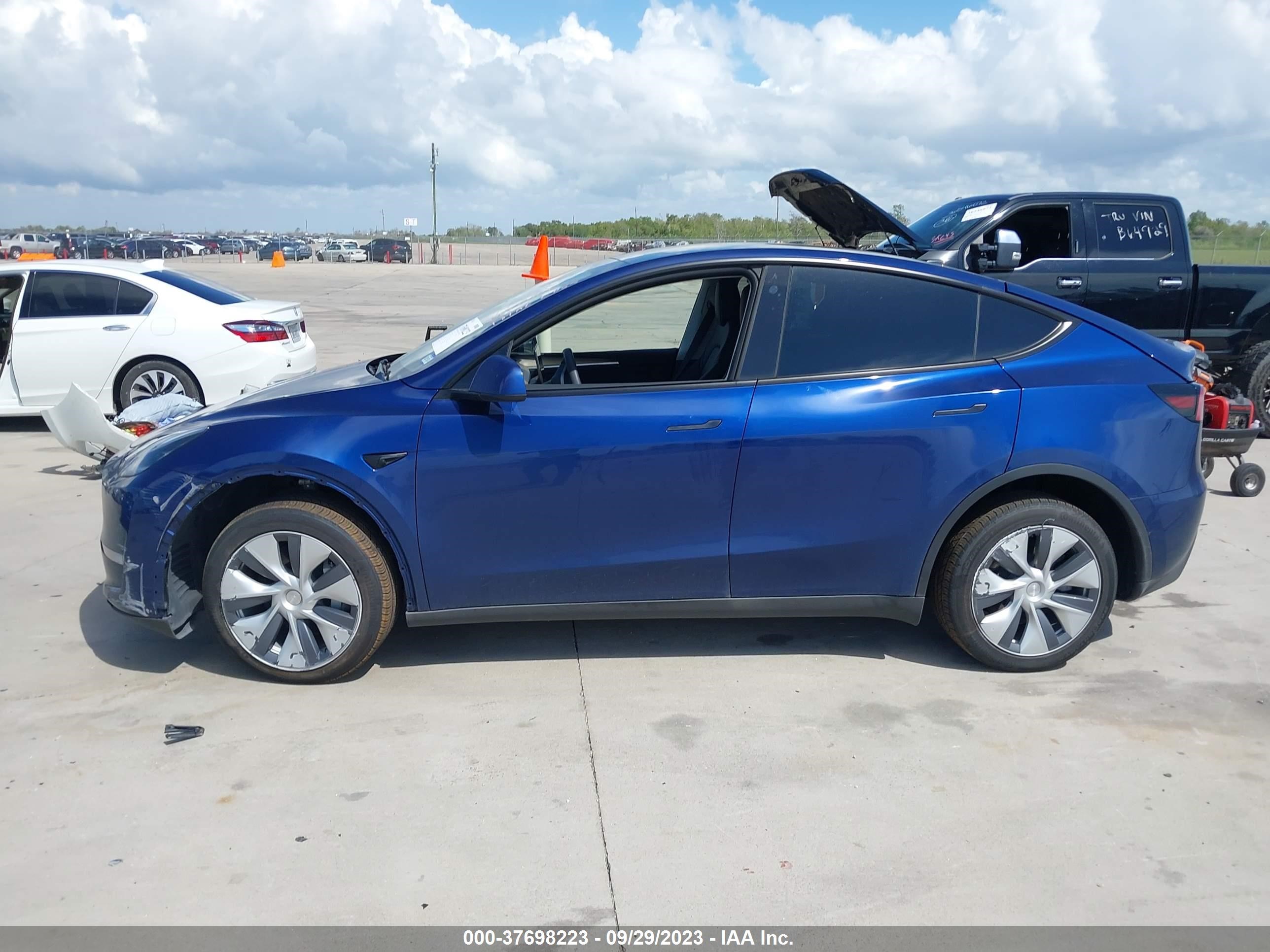 Photo 12 VIN: 7SAYGDEE5PA053895 - TESLA MODEL Y 