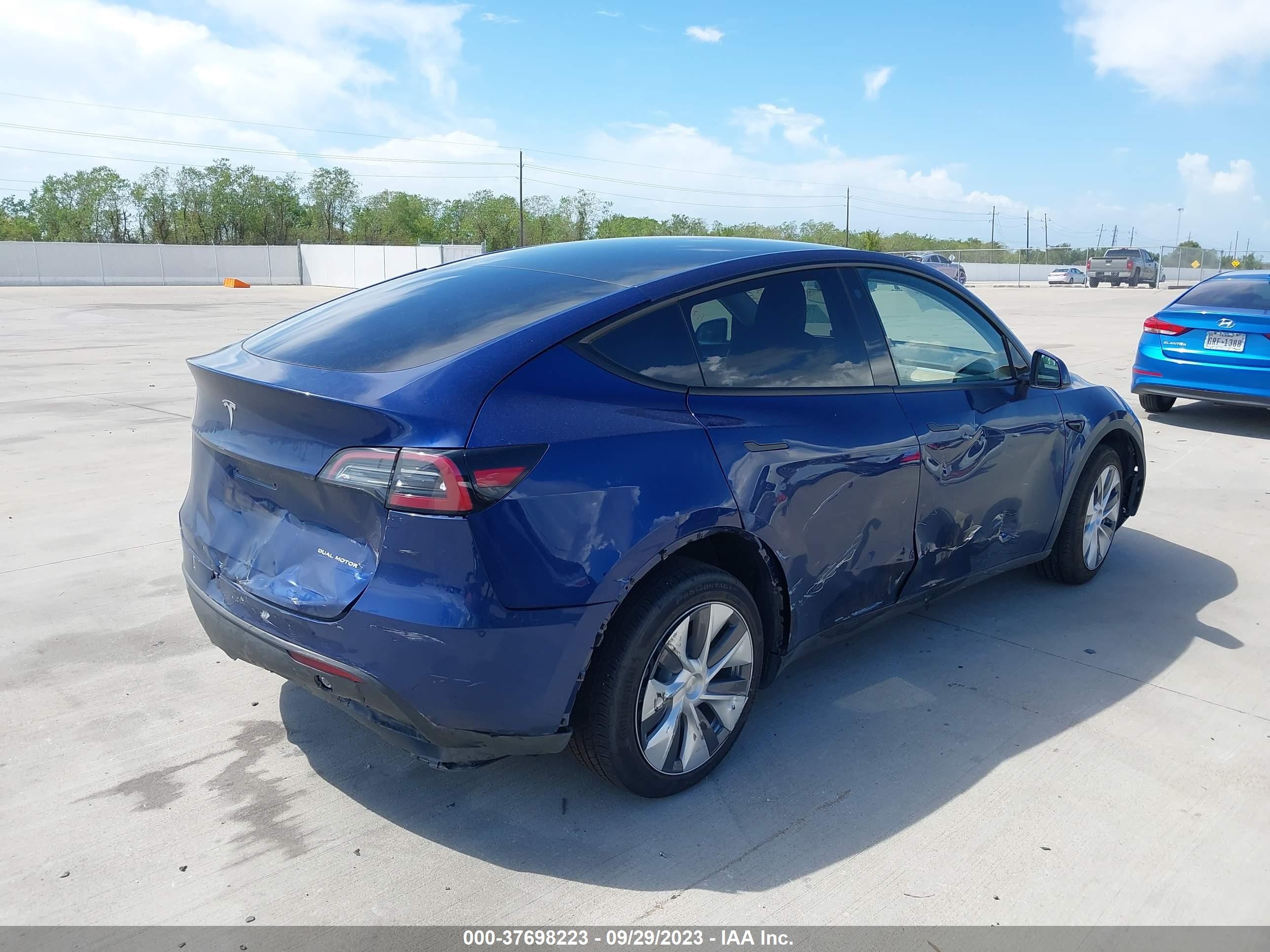 Photo 5 VIN: 7SAYGDEE5PA053895 - TESLA MODEL Y 