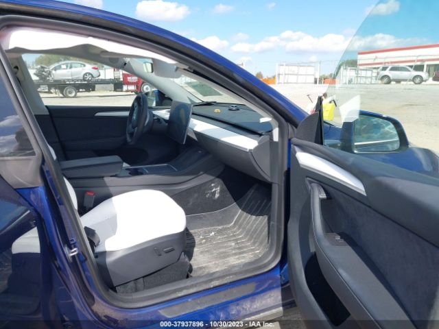 Photo 4 VIN: 7SAYGDEE5PA091501 - TESLA MODEL Y 