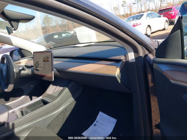 Photo 4 VIN: 7SAYGDEE6PF874233 - TESLA MODEL Y 