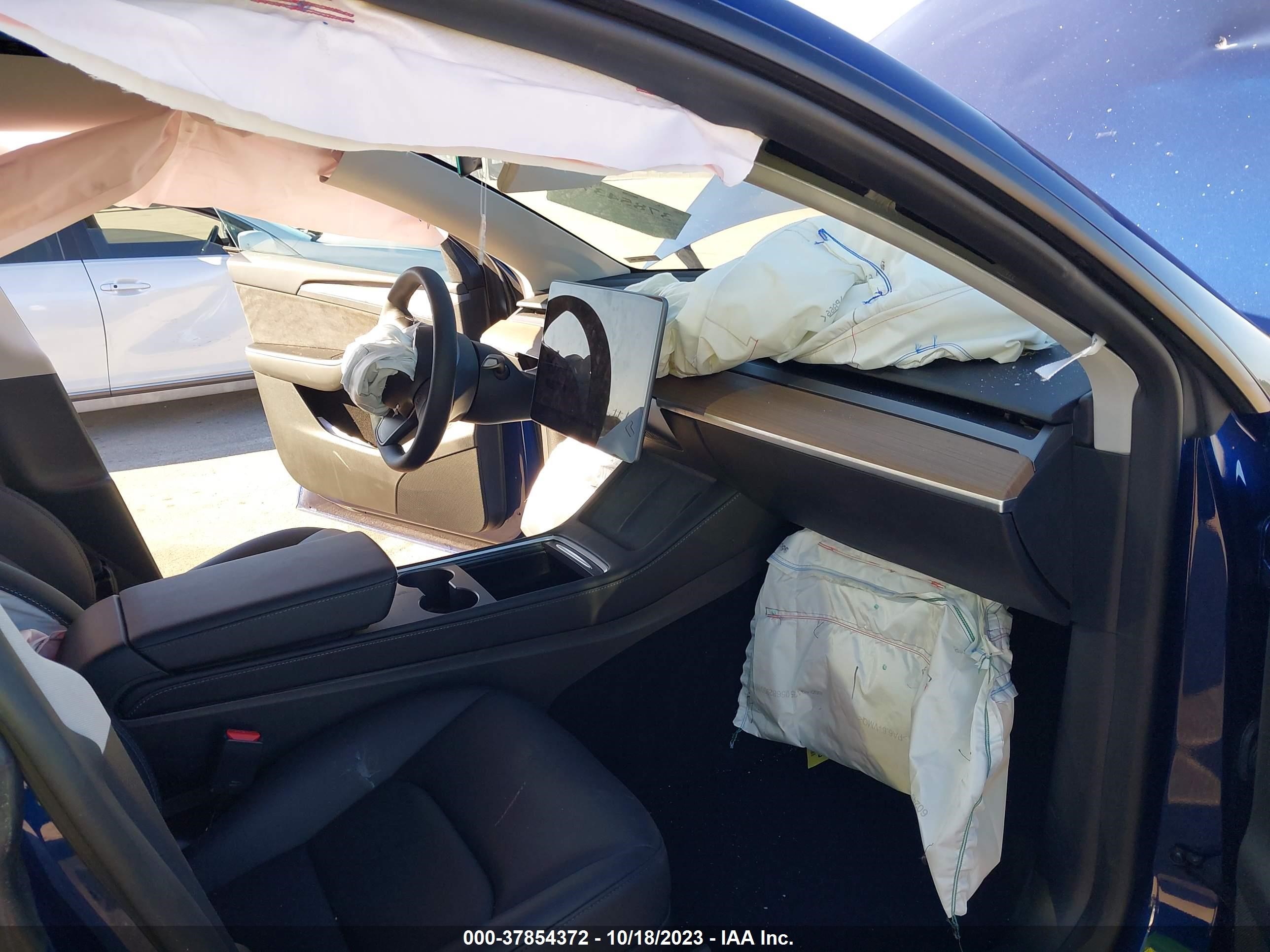 Photo 4 VIN: 7SAYGDEF2PF776695 - TESLA MODEL Y 