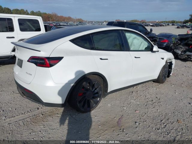 Photo 3 VIN: 7SAYGDEF9PF703016 - TESLA MODEL Y 