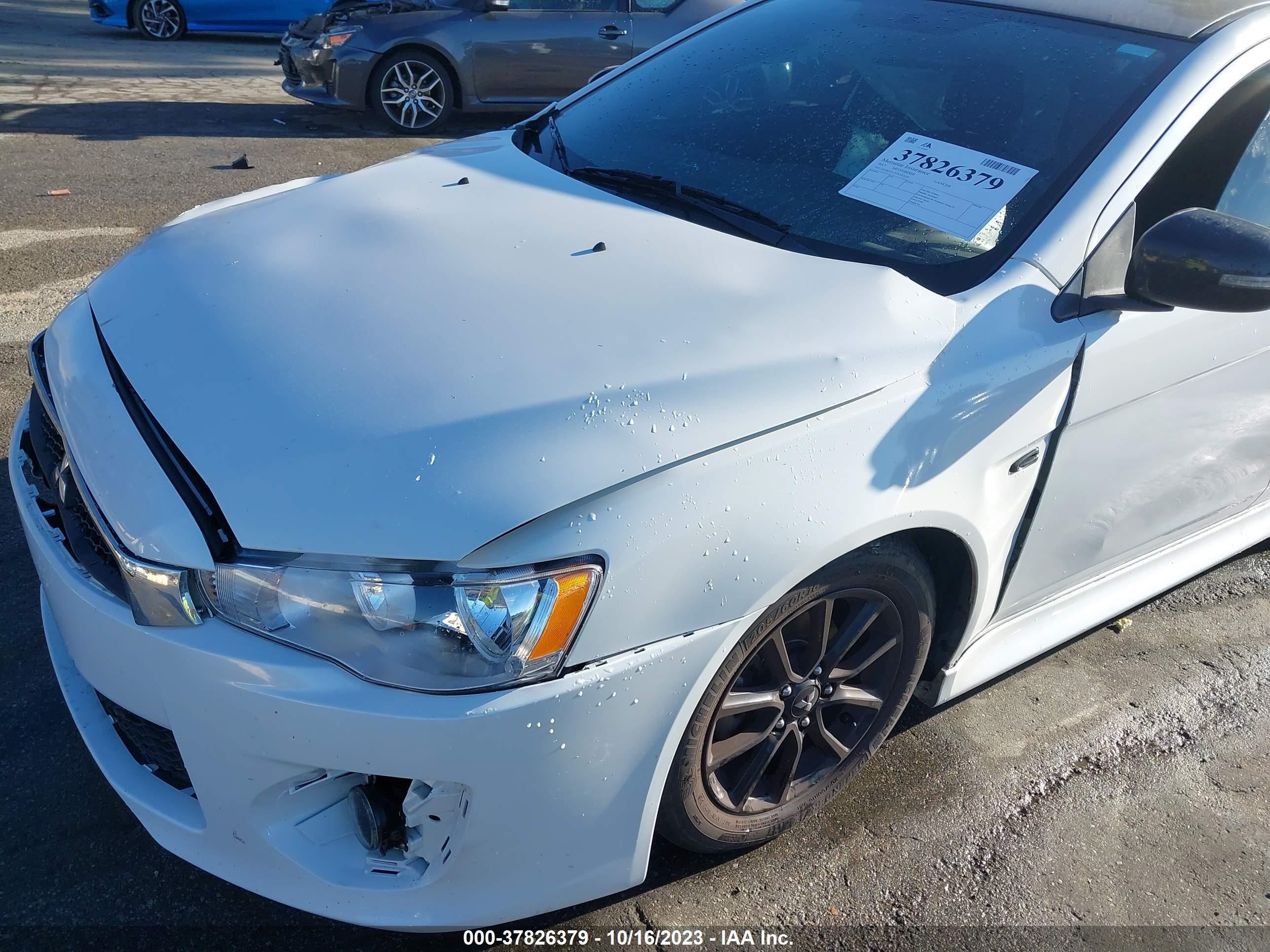 Photo 11 VIN: JA32U2FUXHU012338 - MITSUBISHI LANCER 