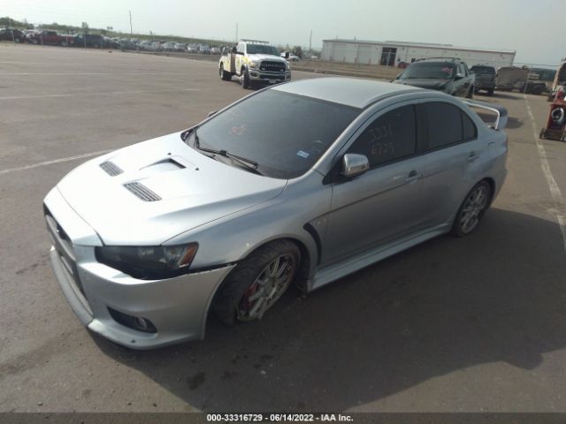 Photo 1 VIN: JA32W8FV2DU009000 - MITSUBISHI LANCER EVOLUTION 