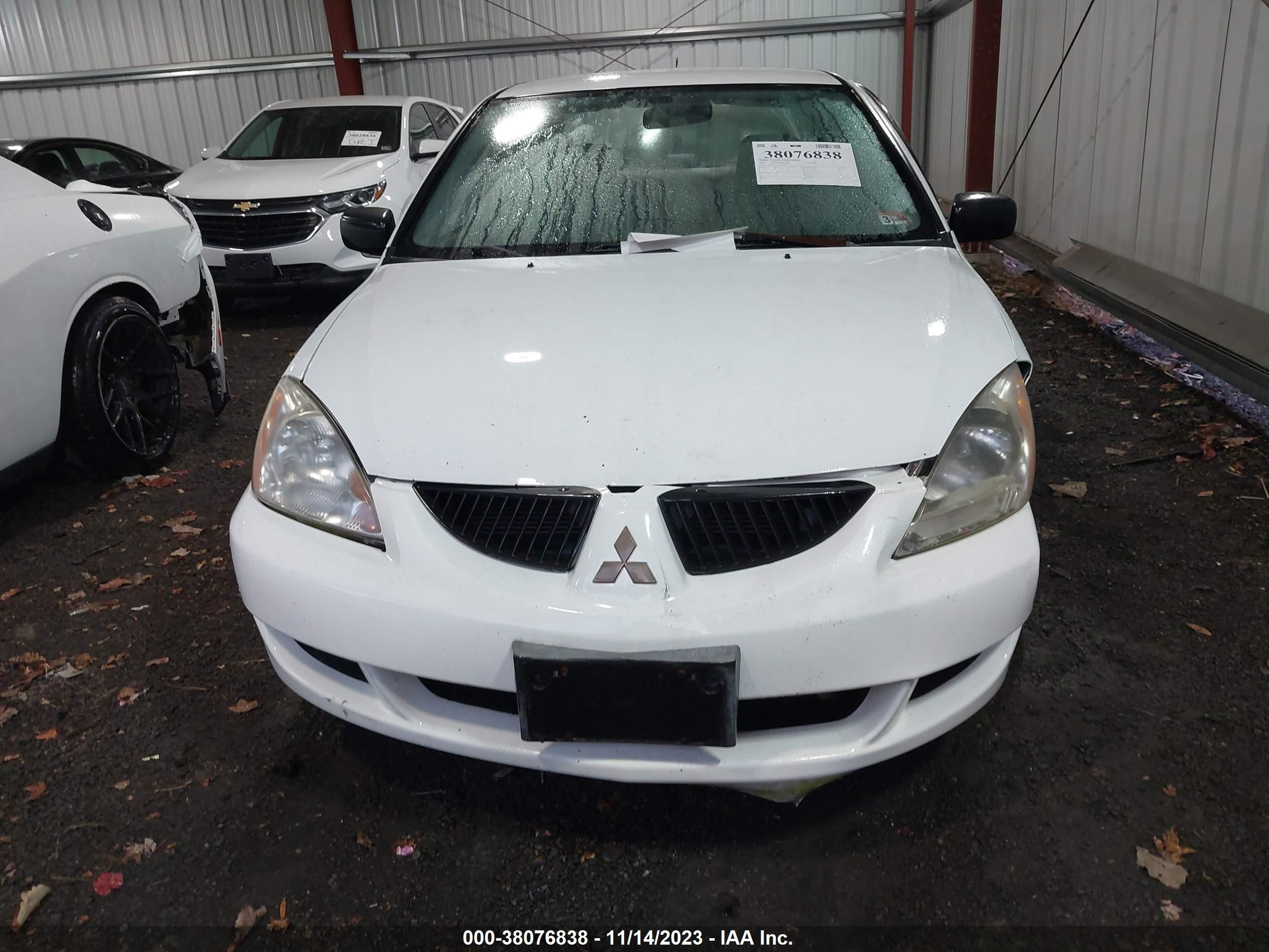 Photo 11 VIN: JA3AJ26E35U032357 - MITSUBISHI LANCER 