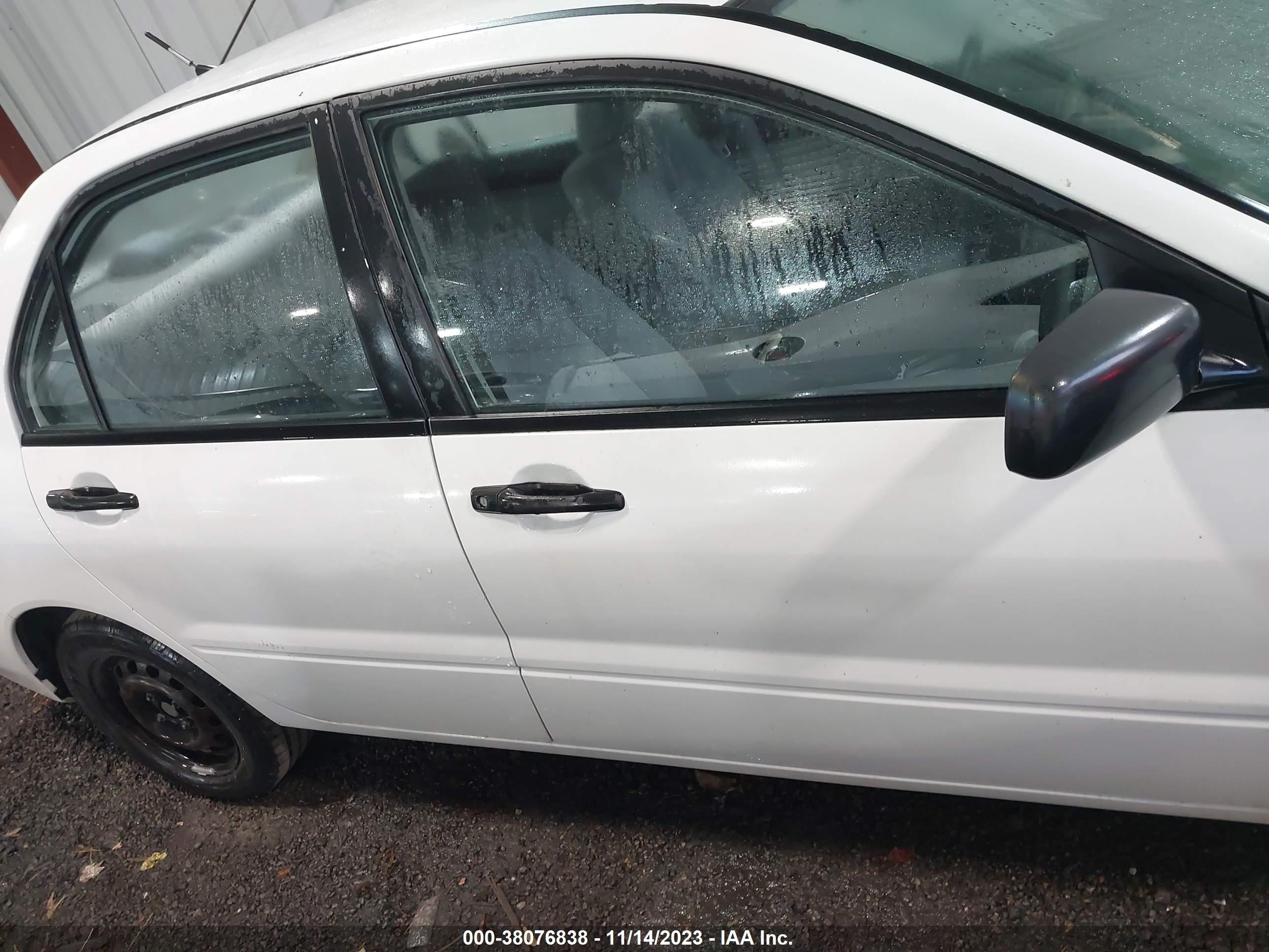 Photo 12 VIN: JA3AJ26E35U032357 - MITSUBISHI LANCER 