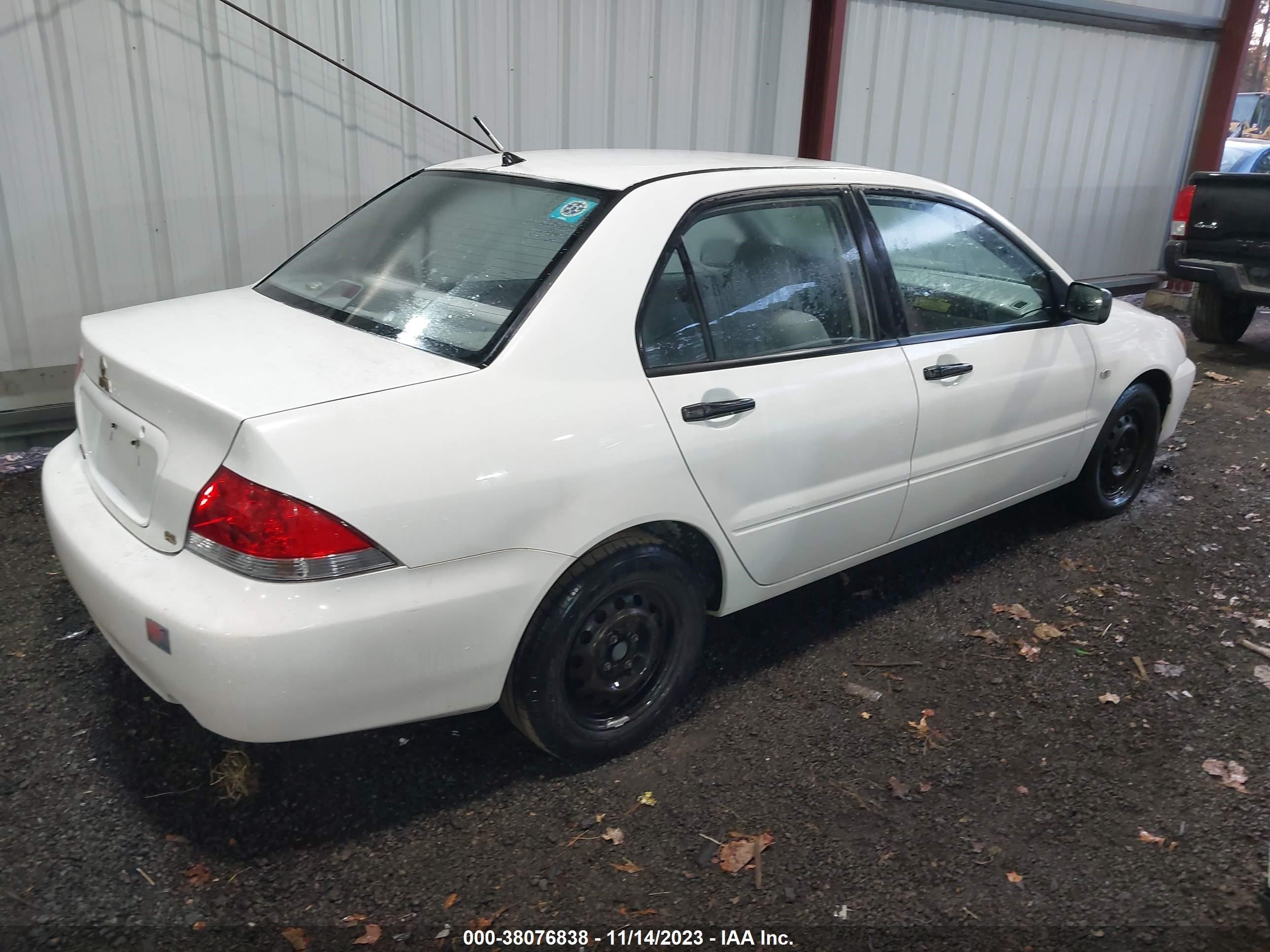 Photo 3 VIN: JA3AJ26E35U032357 - MITSUBISHI LANCER 