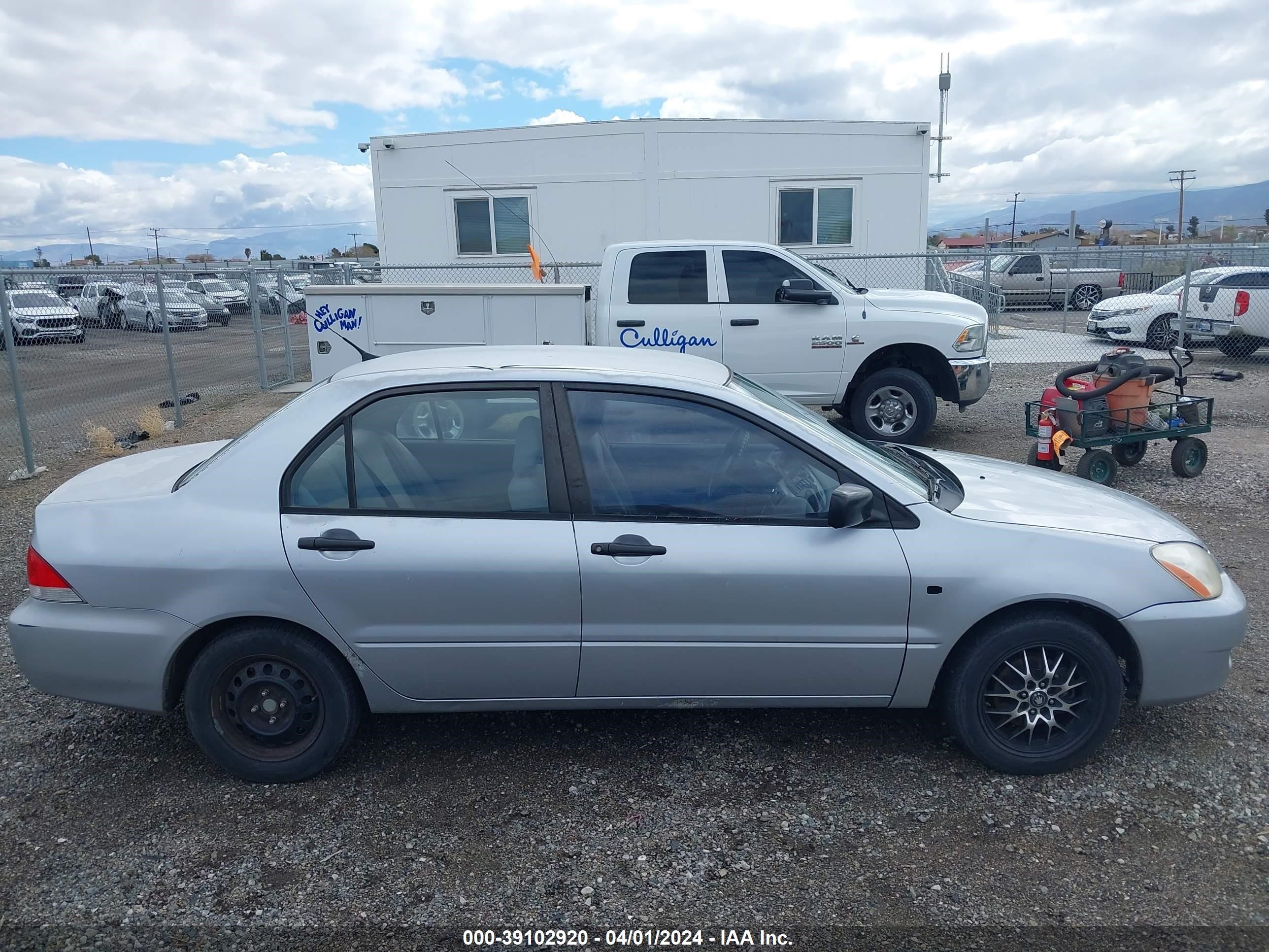 Photo 12 VIN: JA3AJ26E55U042016 - MITSUBISHI LANCER 