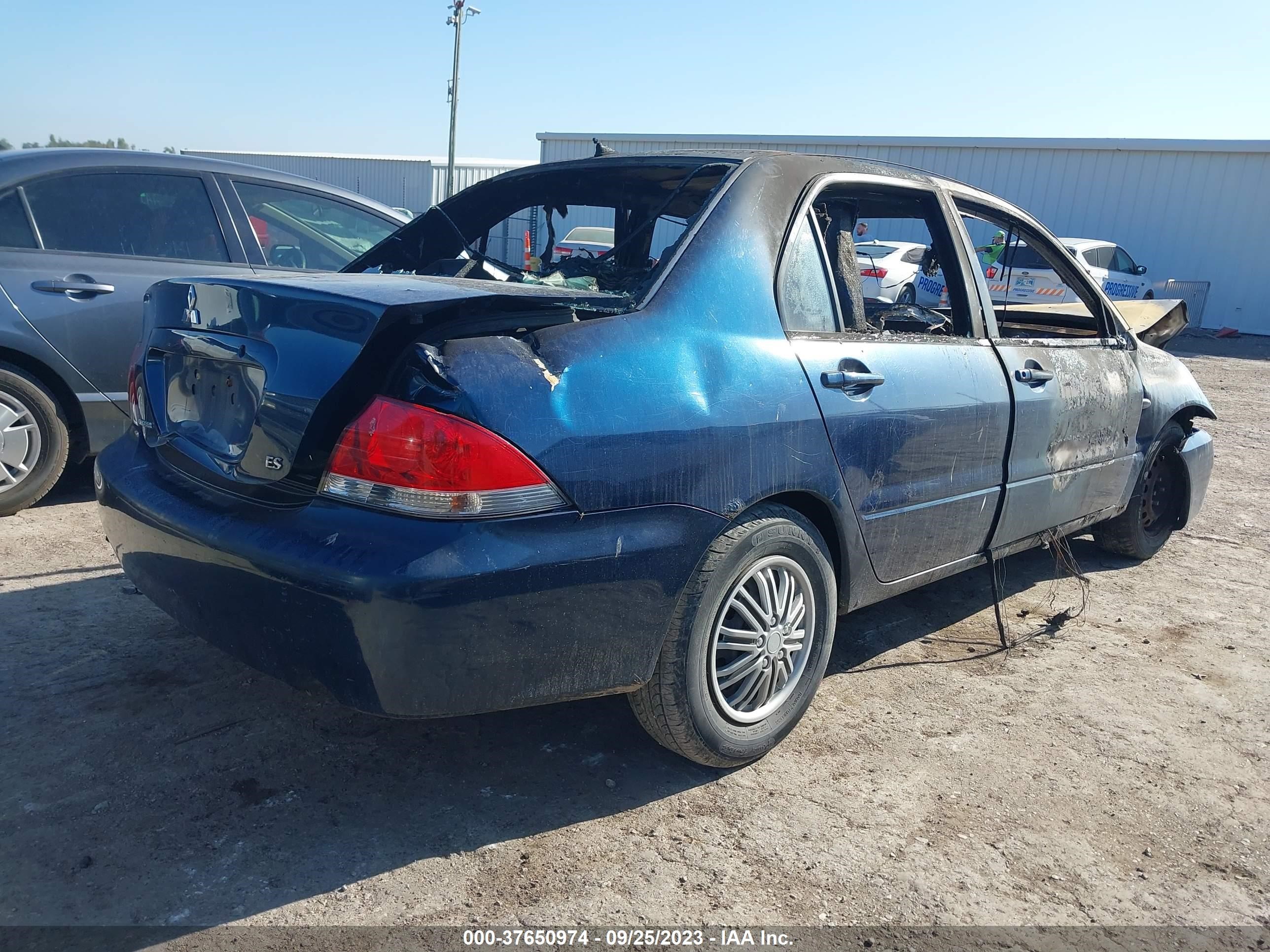 Photo 4 VIN: JA3AJ26E94U009454 - MITSUBISHI LANCER 