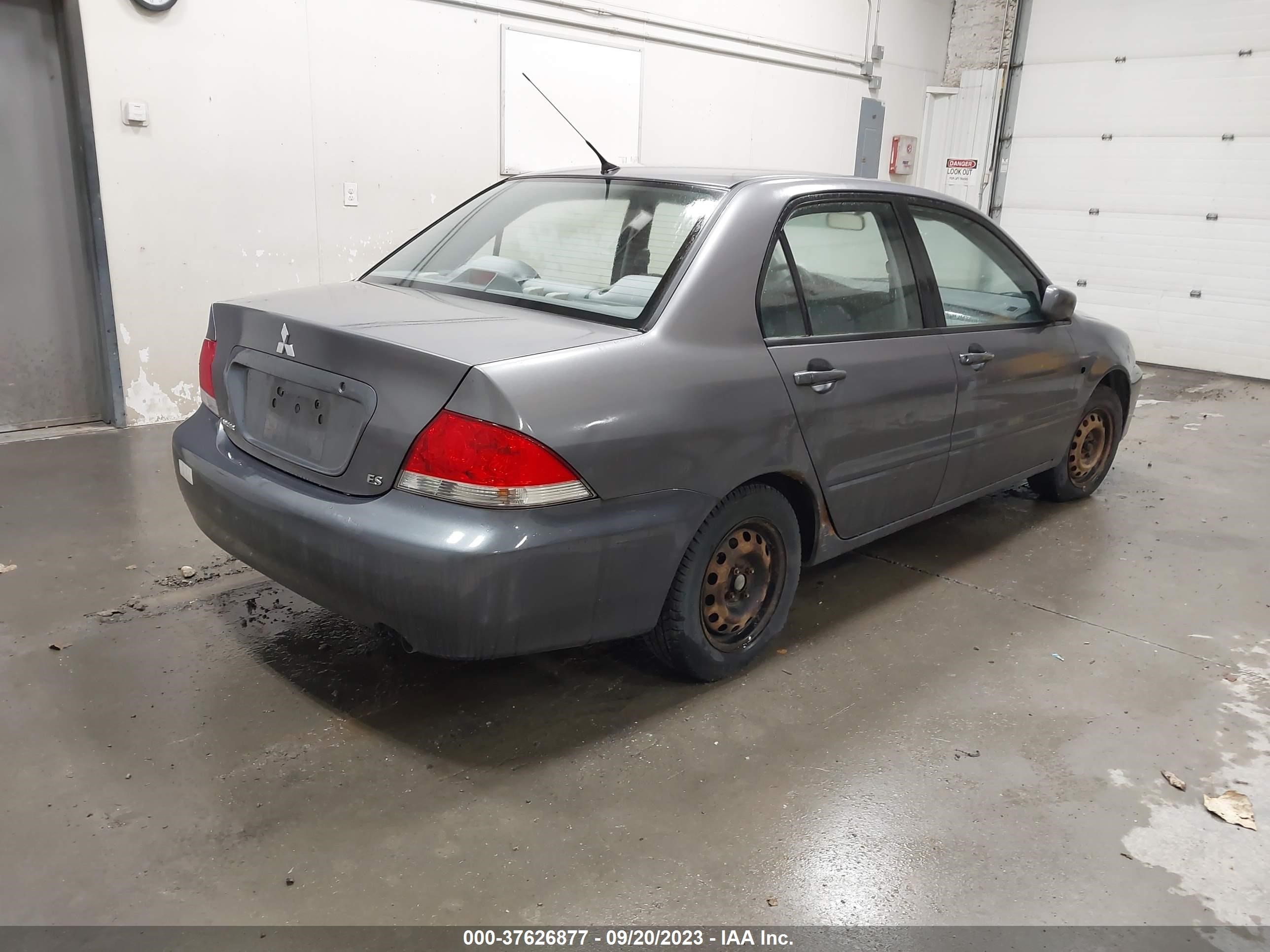 Photo 3 VIN: JA3AJ26EX5U054727 - MITSUBISHI LANCER 