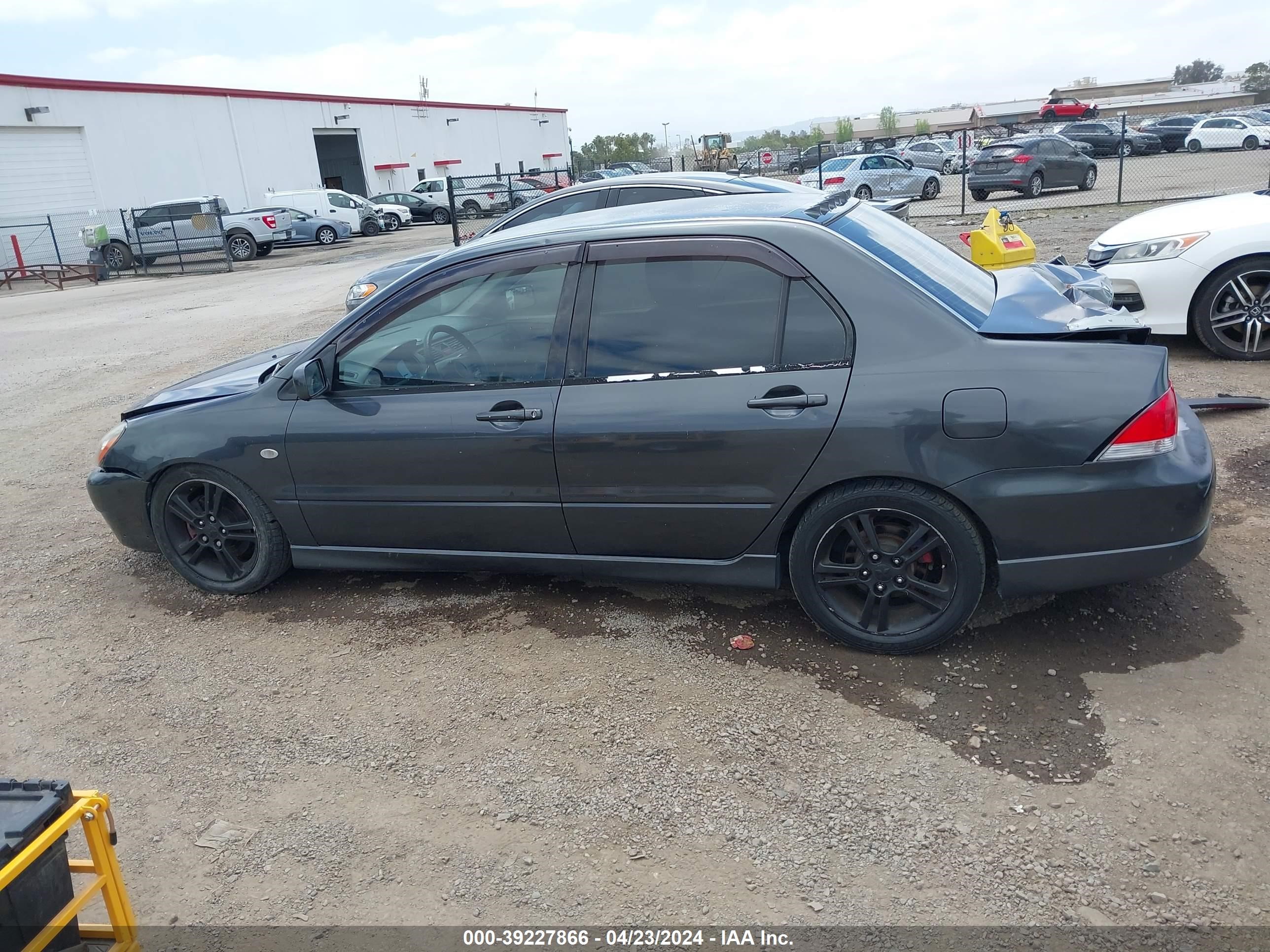 Photo 14 VIN: JA3AJ66F14U018388 - MITSUBISHI LANCER 