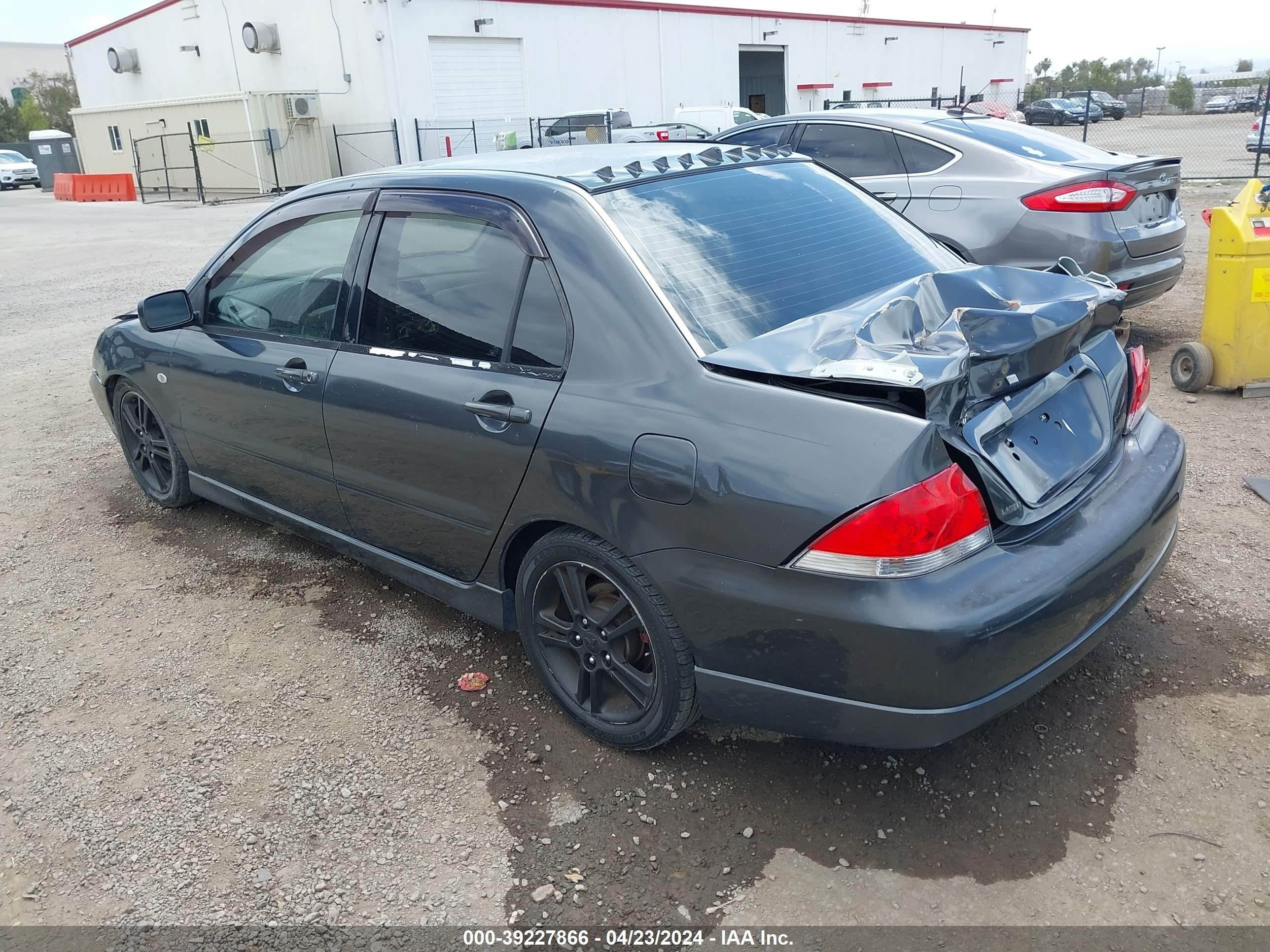 Photo 2 VIN: JA3AJ66F14U018388 - MITSUBISHI LANCER 