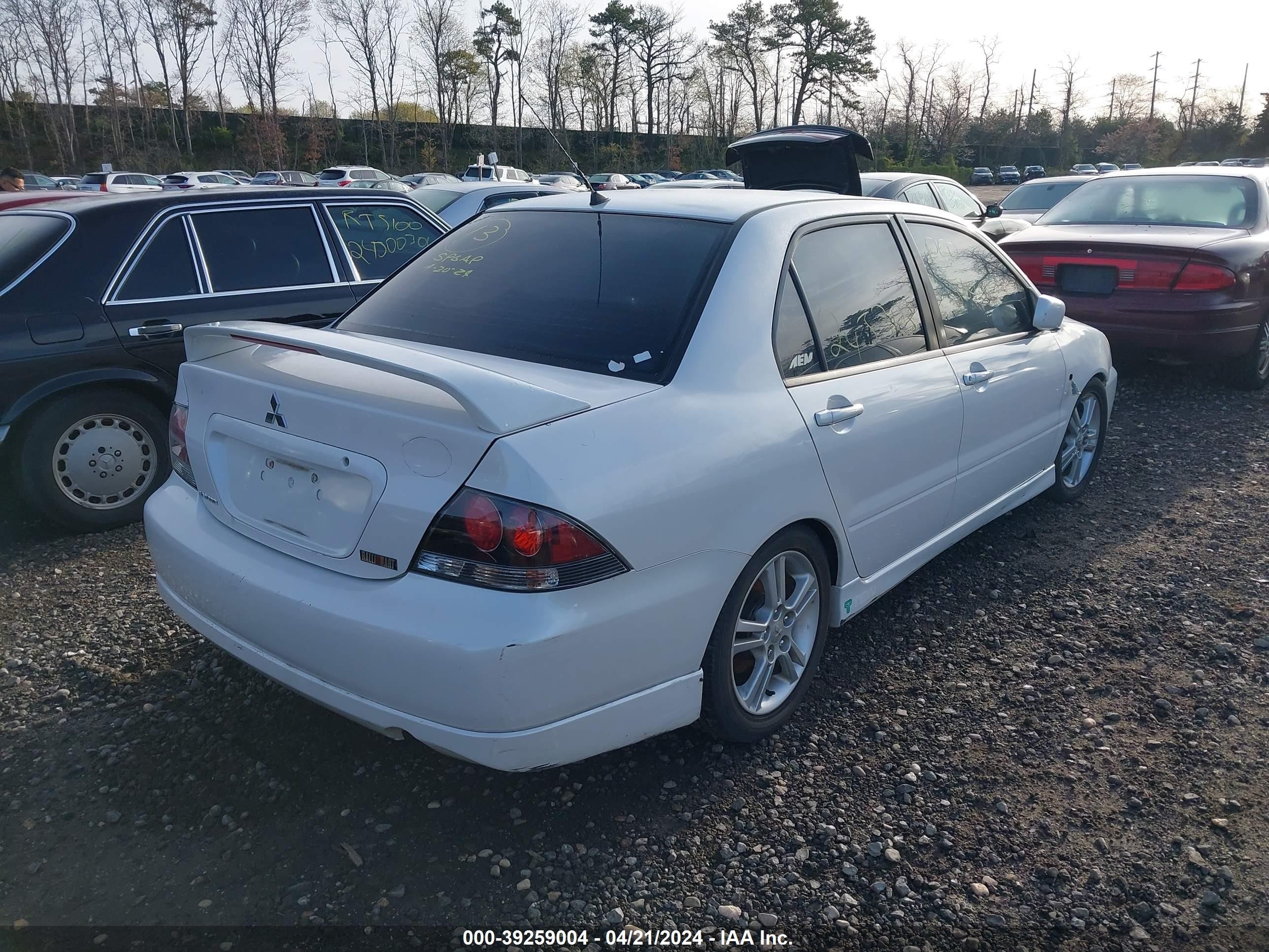 Photo 3 VIN: JA3AJ66F15U006551 - MITSUBISHI LANCER 