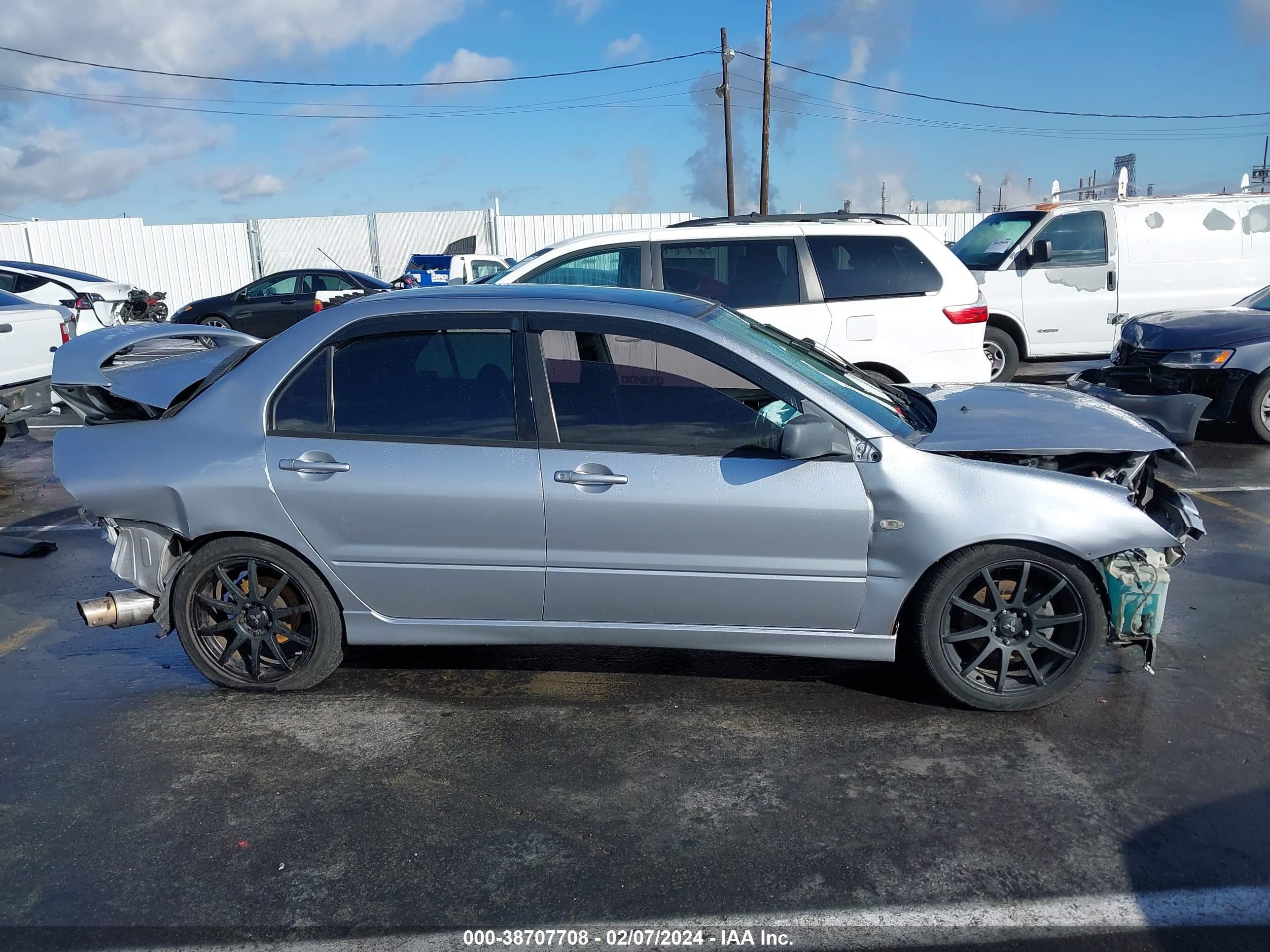 Photo 12 VIN: JA3AJ66F24U022806 - MITSUBISHI LANCER 