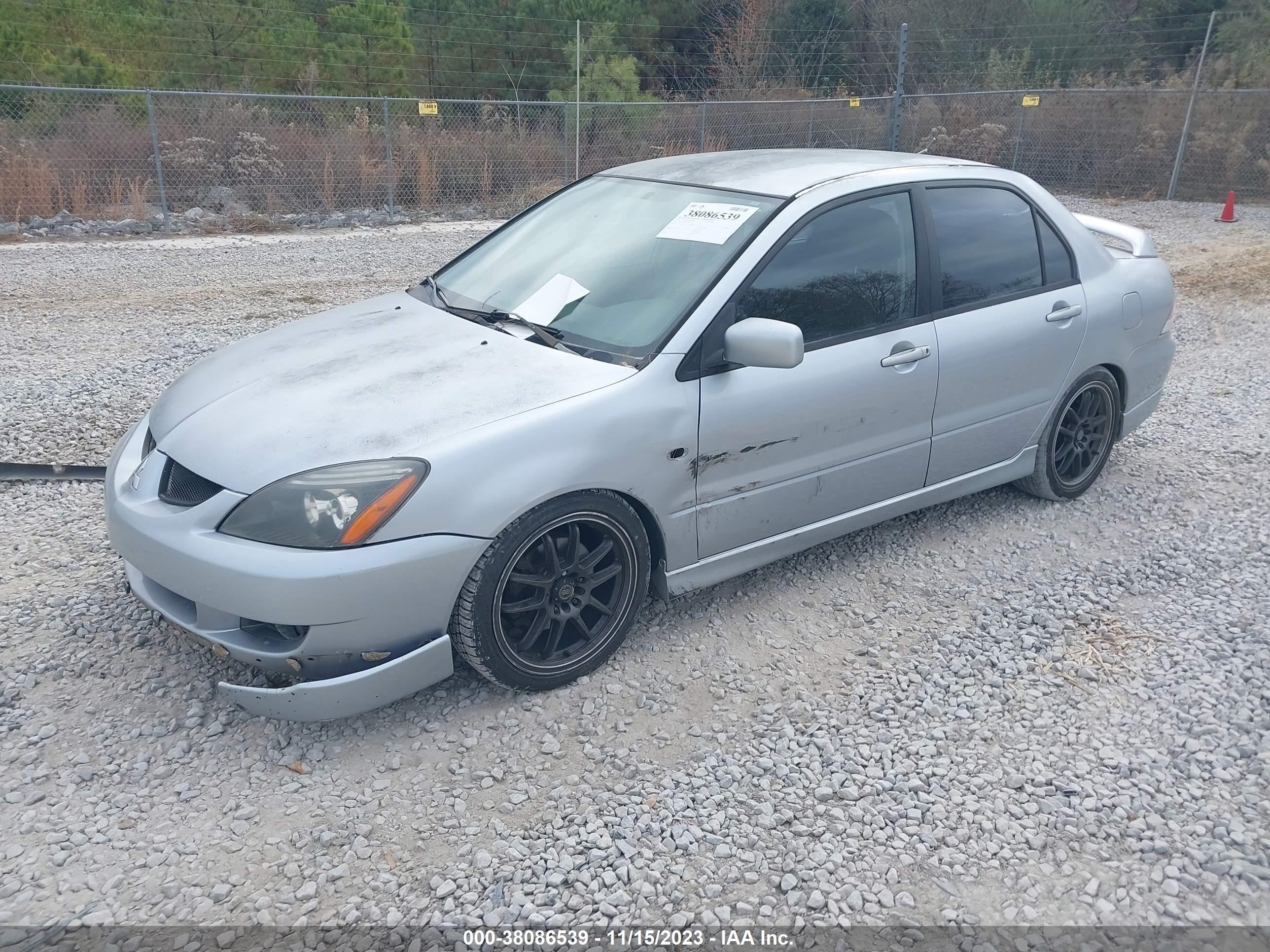 Photo 1 VIN: JA3AJ66F55U016077 - MITSUBISHI LANCER 