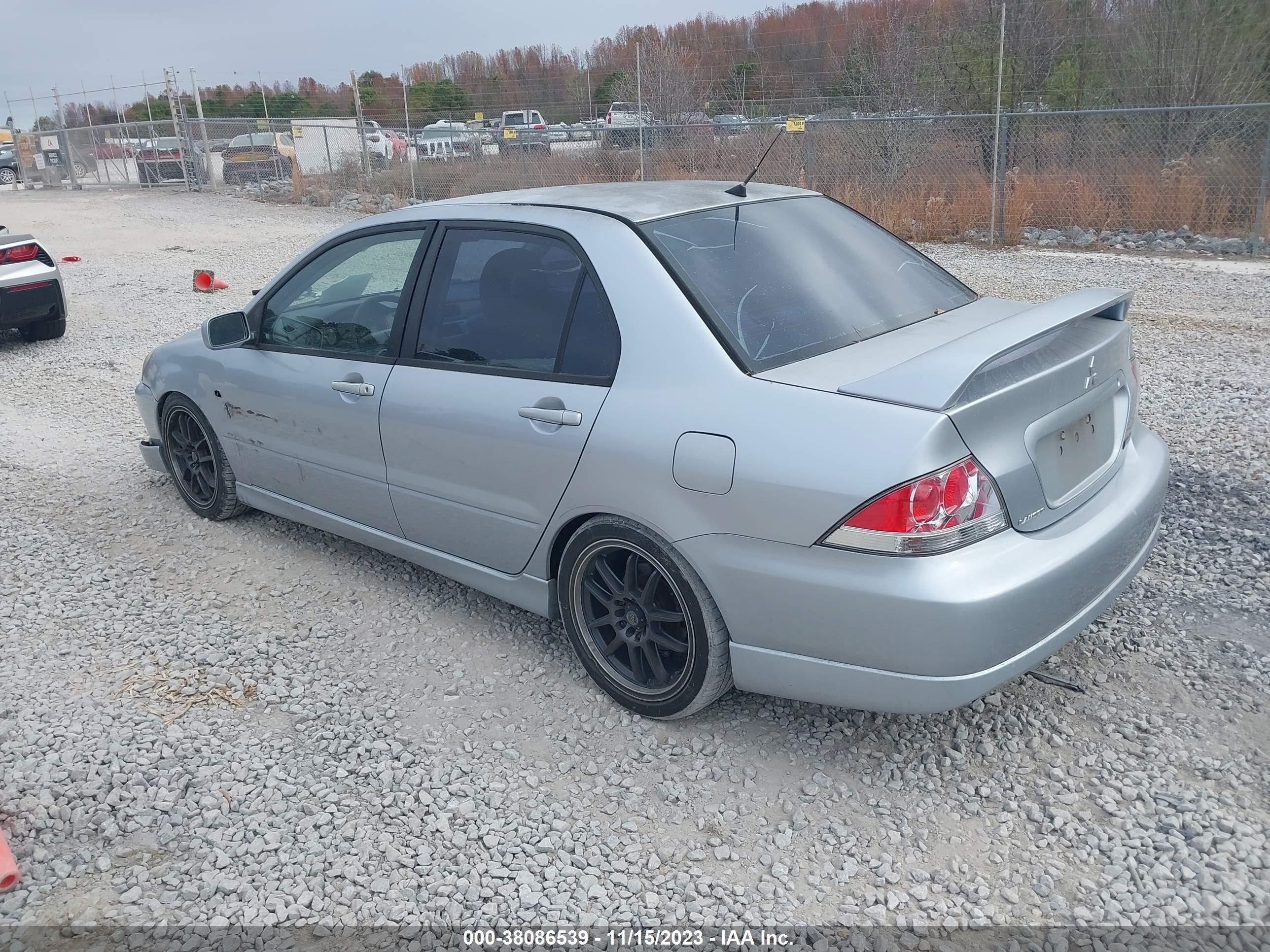 Photo 2 VIN: JA3AJ66F55U016077 - MITSUBISHI LANCER 