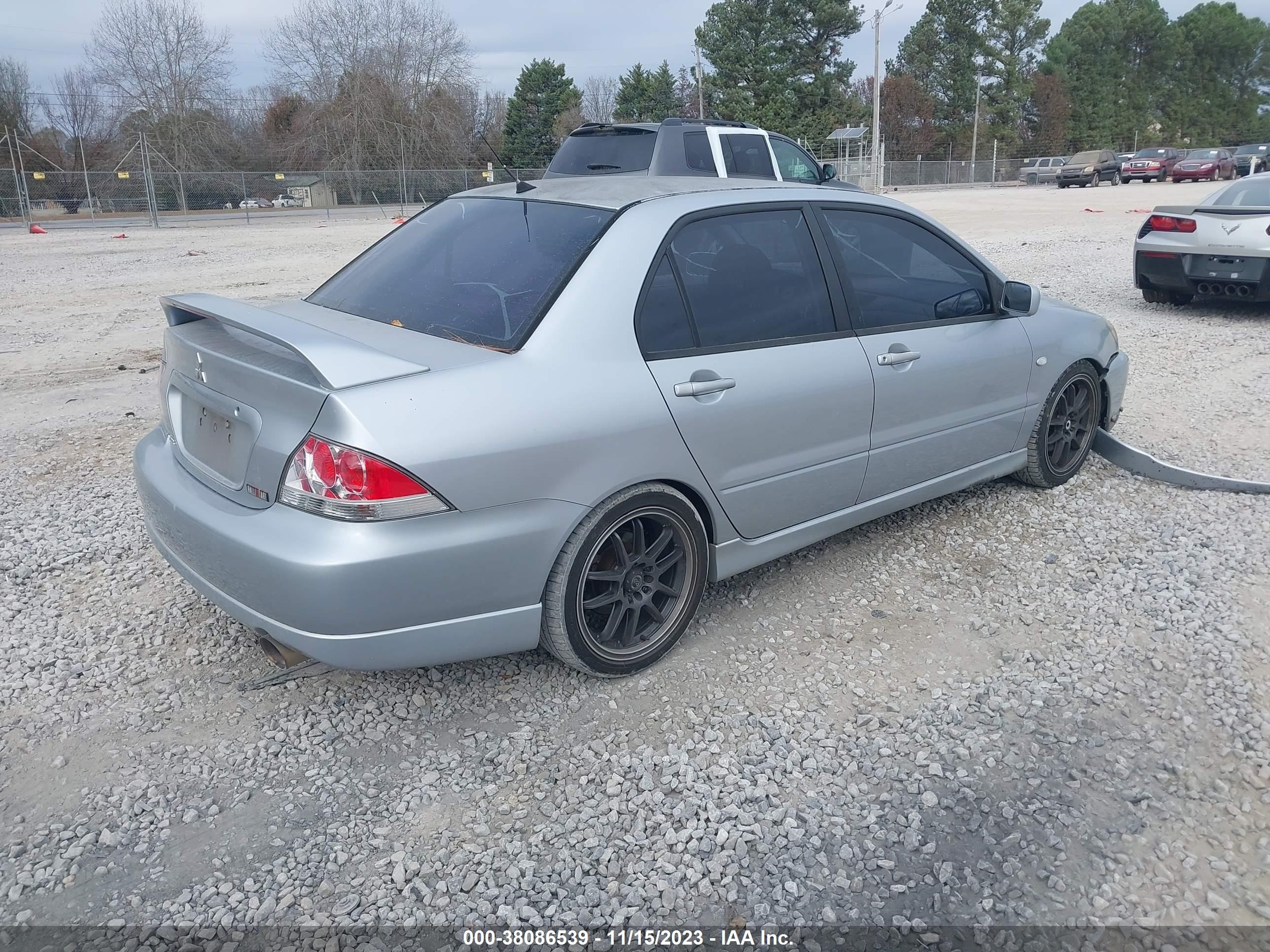 Photo 3 VIN: JA3AJ66F55U016077 - MITSUBISHI LANCER 