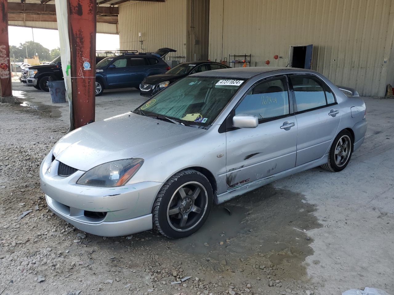 Photo 1 VIN: JA3AJ66FX4U020740 - MITSUBISHI LANCER 